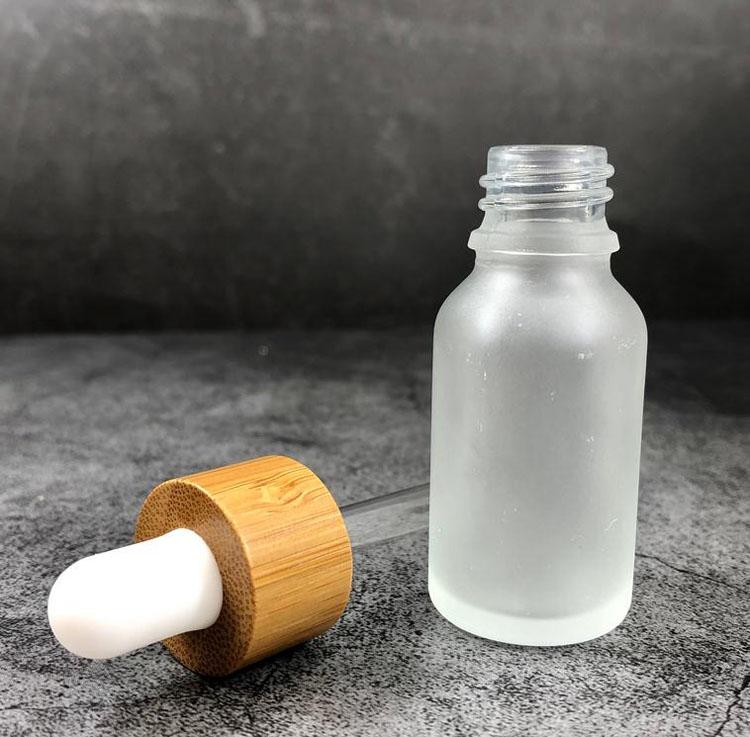 New-5ml-10ml-15ml-20ml-30ml-50ml-Oil-Bottle-With-Bamboo-Essence-In-Frosted-Glass-1000Pcs-3